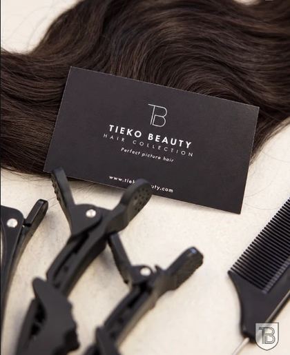 Carousel cover: Tieko Beauty Hair Collection business card on a hair bundle with clips and comb